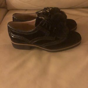 Black faux suede oxfords with Pom Pom. Worn once!